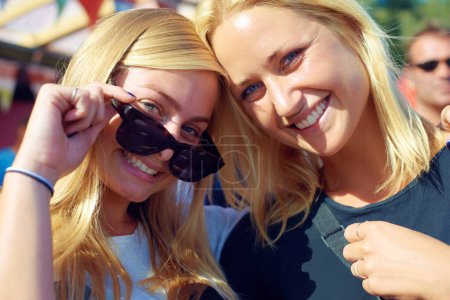 Photo for I just know its gonna be a rocking weekend. two friends enjoying themselves at a festival - Royalty Free Image