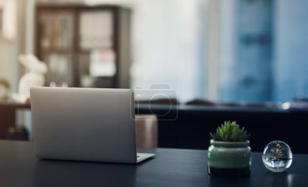 Photo for A space to get productive. Still life shot of a laptop on a table in an office - Royalty Free Image