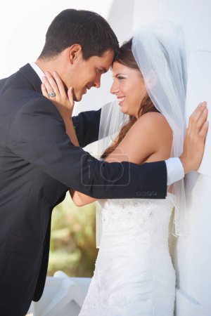 Photo for Theyve found the one. A newlywed couple looking at each lovingly on their wedding day - Royalty Free Image