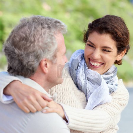 Photo for I could look into your eyes forever. A mature couple smiling at each other while embracing affectionately - Royalty Free Image