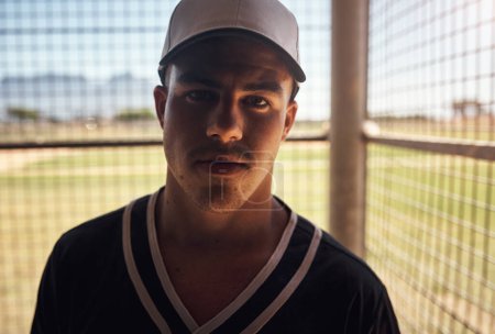 Photo for Want to see a winner Youre looking at him. a young man playing a game of baseball - Royalty Free Image