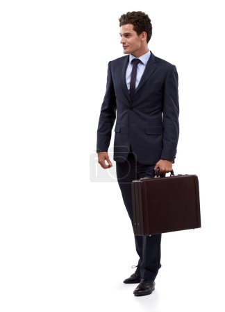 Foto de De camino a la oficina. Un joven hombre de negocios llevando su maleta - Imagen libre de derechos