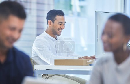 Photo for You have to outwork those around you to become the best. Defocused shot of a businessman looking happy while sitting at his desk - Royalty Free Image