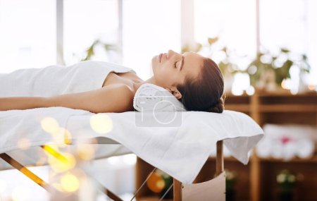 Photo for You know where to find tranquillity. an attractive young woman getting pampered at a beauty spa - Royalty Free Image