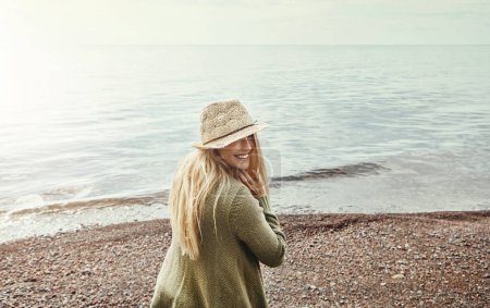 Photo for Time in nature is always worth it. a young woman spending a day at the lake - Royalty Free Image