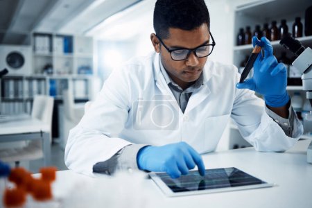 Photo for The science behind saving lives. a young scientist conducting medical research on blood in a laboratory - Royalty Free Image