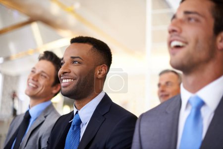 Photo for They like what theyre hearing. a group of businesspeople listening to a work presentation - Royalty Free Image