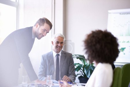 Photo for Getting the job done with teamwork. a group of business colleagues meeting in the boardroom - Royalty Free Image
