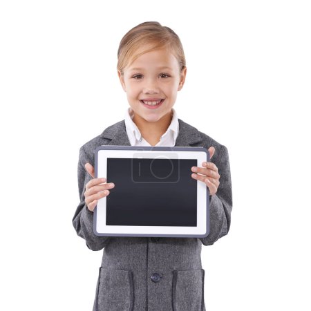 Photo for I love school. Young schoolgirl dressed up in formal clothing looking at the camera while holding a laptop - Royalty Free Image