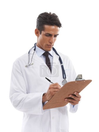Photo for Writing out a prescription for your health needs. A handsome young doctor taking notes on a clipboard against a white background - Royalty Free Image