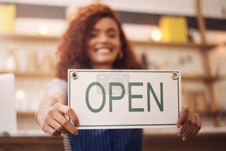 Photo for Open sign, hands and woman in shop, store and advertising notice of retail shopping time, board or trading information. Closeup, small business owner and opening banner for welcome, start or services. - Royalty Free Image