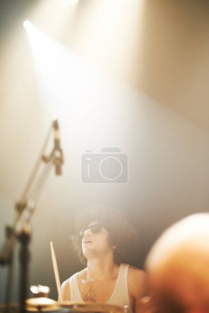 Photo for Music, drums and rock with man at concert for festival, new year and live band performance with mockup. Party, spotlight and celebration with musician drummer on stage for disco, nightclub and show. - Royalty Free Image
