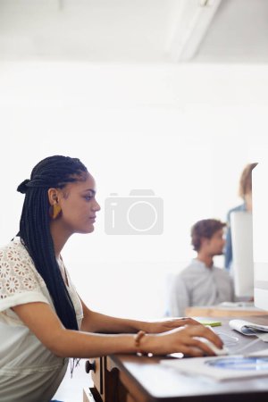 Photo for Journalist, office or girl typing on computer working on email, business project or online research. Laptop, database or serious biracial woman writing blog reports or internet article with focus. - Royalty Free Image