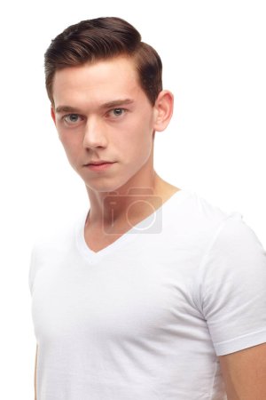 Photo for Fashion, young and portrait of man in studio with confidence, attractive and pride on white background. Youth, confident and face of isolated handsome male person with trendy style in casual clothes. - Royalty Free Image