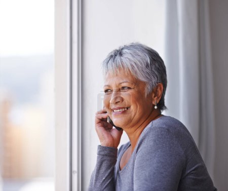 Photo for Phone call conversation, window view and elderly woman smile, communication and talking to retirement contact. Listening, connection and senior female person, lady or cellphone user chat on mobile. - Royalty Free Image