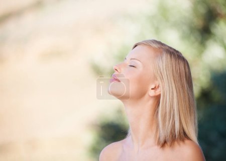 Photo for Face, profile and beauty of a woman outdoor in nature for natural makeup, dermatology or cosmetic. Person smelling air or happy about sustainable skincare, self care or healthy skin glow mockup. - Royalty Free Image