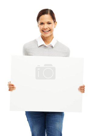 Photo for Put your copy in her hands. Studio portrait of an attractive young woman holding a blank placard isolated on white - Royalty Free Image
