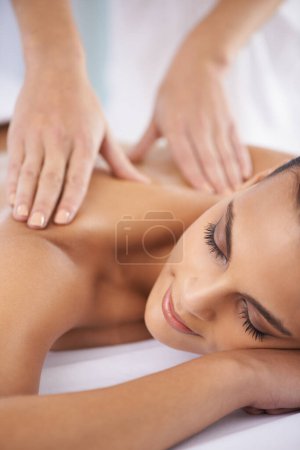 Photo for Luxury, spa and woman with a smile, massage and holistic treatment with self care, grooming and joyful. Female person, lady and client with stress relief, skincare and body care on vacation and break. - Royalty Free Image