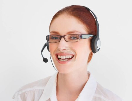Photo for Call center, happy and portrait of woman in studio for telemarketing, customer service and help desk. Smile, communication and contact us with face of consultant on white background for mockup. - Royalty Free Image