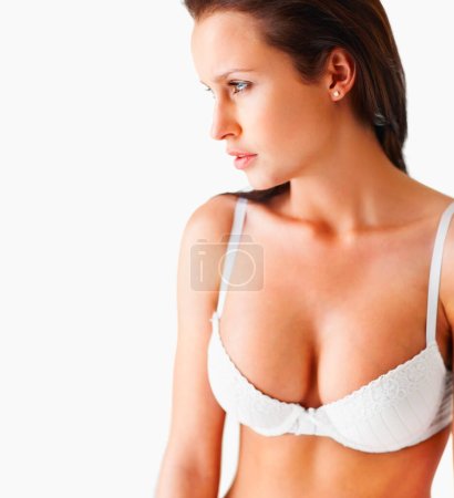 Photo for Lingerie, underwear and body of a woman in a bra on a white background for beauty, fashion and sexuality. Sexy female model thinking about desire, seduction and self love for art deco and marketing. - Royalty Free Image