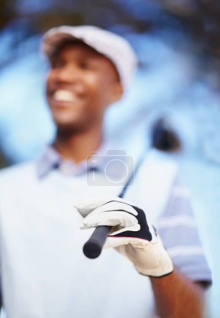 Photo for Sports, club and hand with black man on golf course for training, competition and game. Happiness, fitness and relax with male golfer in outdoors for golfing, summer and workout practice. - Royalty Free Image