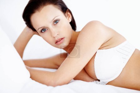 Photo for Lingerie portrait, sexy woman and body in a bra while in her bedroom for beauty, fashion and sexuality. Sexy female model in a house or hotel for desire, underwear and self love for art deco. - Royalty Free Image