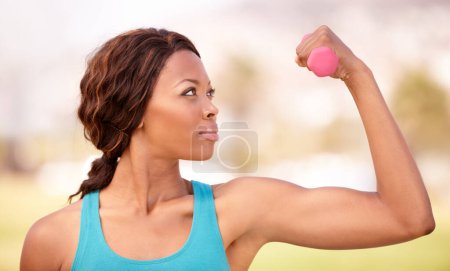 Photo for African woman, dumbbell training and outdoor for focus, strong arm muscle or goal for wellness, Girl, workout and fitness in park, garden or backyard with pride, concentration and health in lifestyle. - Royalty Free Image
