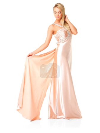 Foto de Beauty, elegant and fashion in a graceful dress or evening gown for prom, formal event or fancy ball against white studio background. Beautiful woman wearing silk bridesmaid outfit for wedding party. - Imagen libre de derechos