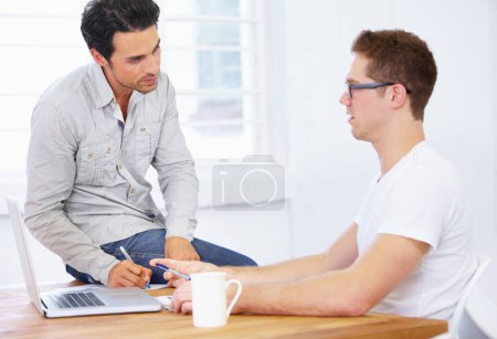 Photo for Laptop, meeting and manager or people planning, discussion and tech feedback, mentor help or website design. Software, computer and IT professional man with boss talking or advice at his office desk. - Royalty Free Image