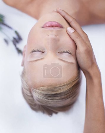 Photo for Relax, massage and face, woman in beauty salon for health, wellness and luxury treatment with from above. Spa, professional skin care therapist hands and healthy facial for girl in holistic therapy - Royalty Free Image