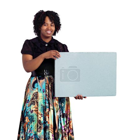 Photo for A message worth noticing. Studio portrait of an african woman holding up a blank board against a white background - Royalty Free Image