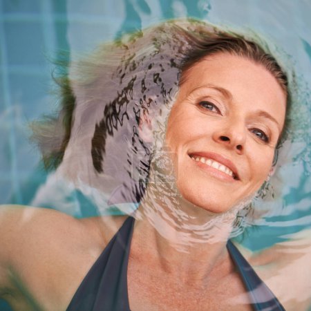 Photo for Swimming pool, portrait and woman relax in water on holiday, summer vacation and weekend getaway. Floating, luxury resort and happy female person relaxing for happiness, wellness and peace outdoors. - Royalty Free Image
