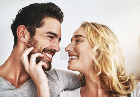 Photo for Smile, faces or happy couple in house bonding or smiling with trust, romance or loyalty together. Eye contact, affection or woman loves quality time with a romantic man on holiday weekend at home. - Royalty Free Image