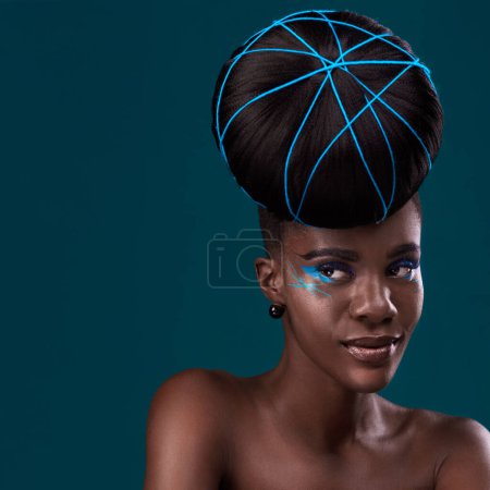 Photo for Thinking, hair and mockup with a model black woman in studio on a blue background for beauty. Idea, space and cosmetics with an attractive young female person at the salon for fashion or makeup. - Royalty Free Image