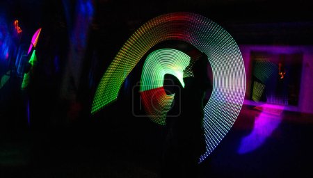 Photo for Light, art and abstract illustration against a black background for energy, glow or movement. Neon, creative and colorful pattern with long exposure for speed, vibration or texture with color splash. - Royalty Free Image