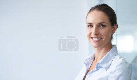 Photo for Shes the face of her company. A cropped shot of a smiling businesswoman in the office - Royalty Free Image