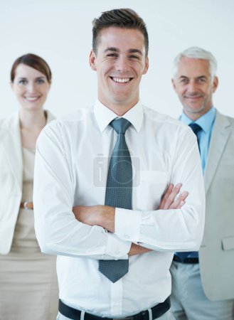 Photo for Well get it done. a three corporate coworkers in an office - Royalty Free Image