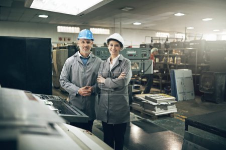 Photo for Weve got your printing needs covered. Portrait of two managers standing inside a printing and packaging plant - Royalty Free Image