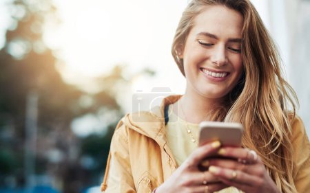 Photo for Woman laugh at meme on smartphone, communication in city and chat on social media with connectivity outdoor. Happy young female person in urban street, text contact with mobile app and comedy online. - Royalty Free Image