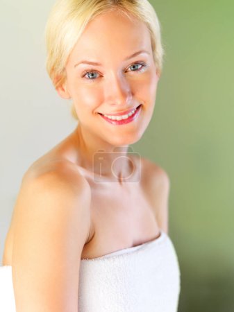 Foto de Skincare, beauty and portrait of woman in bathroom for shower, cleaning and hygiene. Wellness, luxury and cosmetology with face of girl and towel for dermatology, cosmetics and facial at home. - Imagen libre de derechos