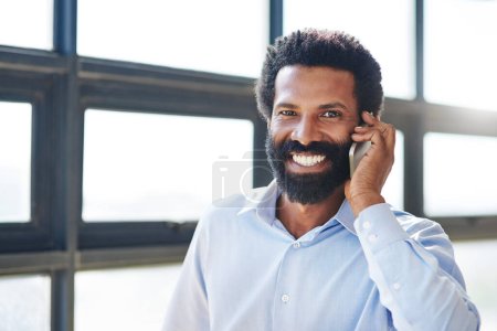 Photo for Portrait, smile and phone call with a business man in the office closeup for communication or networking. Happy, face and mobile contact with a male employee in the workplace during his break. - Royalty Free Image