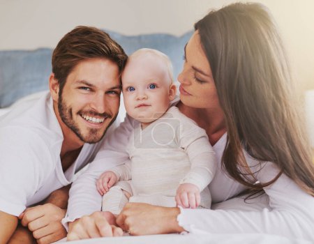 Photo for Happy father, mother and baby for love, care and quality time to relax together in family home. Mom, dad and parents with cute infant kid for happiness, support and newborn development. - Royalty Free Image