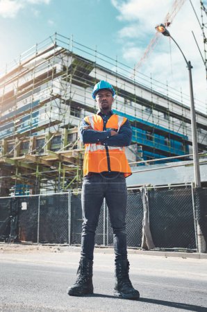 Photo for Construction, engineer man and portrait at building project for development and architecture. Black male contractor serious about project management, engineering and inspection outdoor in city. - Royalty Free Image