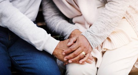 Photo for Holding hands, senior couple and support while together for empathy, love and care in marriage. Closeup of elderly man and woman with hope, respect and communication or kindness outdoor in retirement. - Royalty Free Image