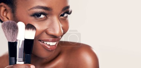Photo for Cosmetics, makeup brushes and portrait of black woman in mockup space on studio with cosmetic application tools. Skincare, blush and beauty banner, luxury facial skin care model on white background - Royalty Free Image