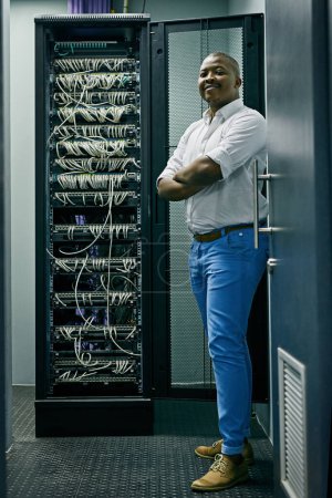 Photo for Server room, confident black man or portrait of technician with cables for online cyber security or hardware cords. IT support, happy or proud African engineer fixing wires for information technology. - Royalty Free Image
