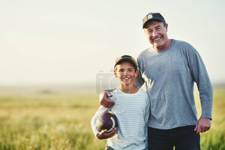 Photo for Father, kid portrait and rugby ball in countryside field for bonding and fun in nature. Mockup, dad and young child together with happiness and smile ready for sporty active game outdoor on farm. - Royalty Free Image