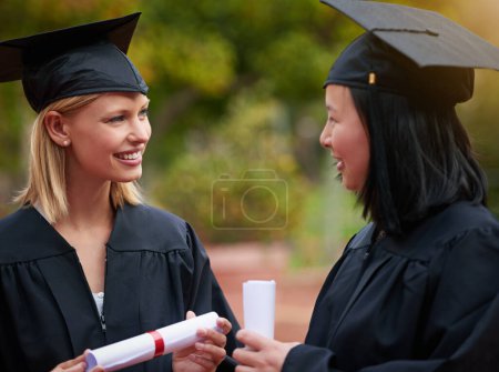 Photo for Graduation, girl friends and study diploma of students with happy communication outdoor. Mockup, female student and campus graduate with happiness and college achievement with diversity and toga. - Royalty Free Image