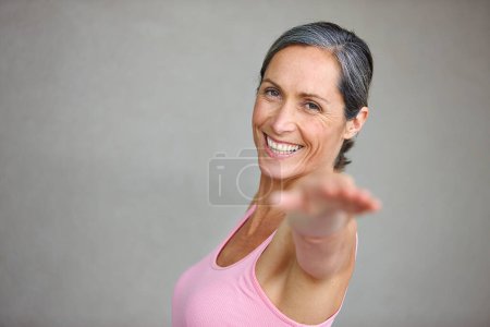 Photo for Senior woman, portrait and yoga pose with smile in studio with mockup space for health, balance and exercise on wall background. Face, meditation and mature lady happy with zen workout or training. - Royalty Free Image