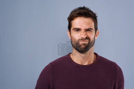 Photo for Doubt, unsure and portrait of man in studio with doubtful, uncertain and thoughtful on gray background. Thinking, mockup space and face of male person skeptical for decision, choice and question. - Royalty Free Image
